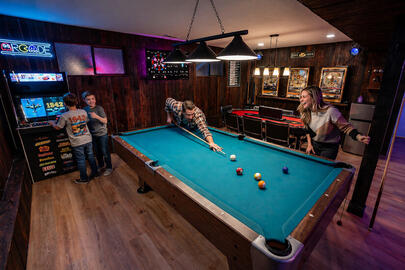 Enjoy a dedicated game room with a pool table